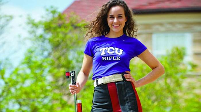 Sarah Scherer Oursland holds her rifle. (Shooting Sports USA)